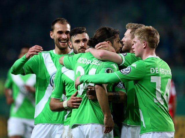 Wolfsburg's Swiss defender Ricardo Rodriguez celebrates after scoring  during the German Football Cup DFB Pokal quarter-final football match between VfL Wolfsburg and SC Freiburg in Wofsburg, central Germany, on April 7, 2015