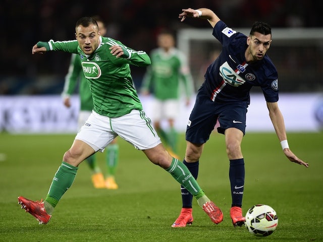 St Etienne's French midfielder Yohan Mollo (L) fights for the ball with Paris Saint-Germain's Argentinian midfielder Javier Pastore on April 8, 2015 
