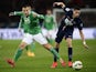 St Etienne's French midfielder Yohan Mollo (L) fights for the ball with Paris Saint-Germain's Argentinian midfielder Javier Pastore on April 8, 2015 