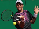 Austrian Andreas Haider-Maurer hits a return to Latvian Ernests Gulbis during their tennis match of the Monte-Carlo Masters Series Tournament, on April 13, 2015