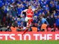 Alexis Sanchez of Arsenal celebrates as he scores their second goal during the FA Cup Semi Final between Arsenal and Reading at Wembley Stadium on April 18, 2015