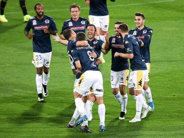 Eddy Bosnar of the Mariners is congratulated on his goal by teammates during the round 26 A-League match between the Wellington Phoenix and the Central Coast Mariners at Westpac Stadium on April 17, 2015