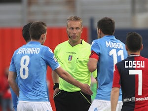 Christian Maggio of Napoli is sent off during the Serie A match between at Stadio Sant'Elia on April 19, 2015