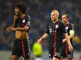 Dante, Sebastian Rode, Philipp Lahm and Robert Lewandowski of Bayern Muenchen look dejected in defeat after the during the UEFA Champions League Quarter Final first leg match between FC Porto and FC Bayern Muenchen at Estadio do Dragao on April 15, 2015