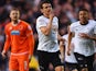 Niall Maher of Blackpool looks dejected as Craig Bryson of Derby County celebrates with Jesse Lingard as he scores their first goal during the Sky Bet Championship match between Derby County and Blackpool at iPro Stadium on April 14, 2015
