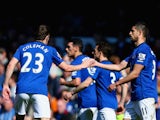 Seamus Coleman of Everton congratulates Kevin Mirallas of Everton on scoring the opening goal during the Barclays Premier League match between Everton and Burnley at Goodison Park on April 18, 2015