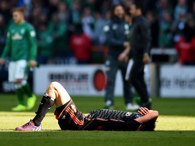 Hamburg's defender Heiko Westermann reacts after the German first division Bundesliga football match SV Werder Bremen vs Hamburger SV in Bremen, northern Germany, on April 19, 2015