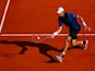 John Isner of USA plays a volley in his match against Steve Johnson of USA during day two of the Monte Carlo Rolex Masters tennis at the Monte-Carlo Sporting Club on April 13, 2015