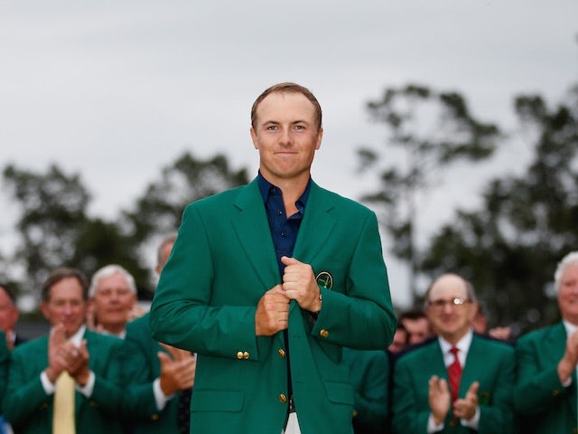 Jordan Spieth wears his green jacket after winning The Masters on April 12, 2015