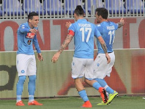 Ten-man Napoli comfortably beat Cagliari