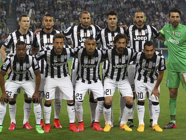 Juventus FC team line up before the UEFA Champions League Quarter Final First Leg match between Juventus and AS Monaco FC at Juventus Arena on April 14, 2015