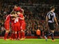Joe Allen of Liverpool celerbates with team mates as he scores their second goal during the Barclays Premier League match between Liverpool and Newcastle United at Anfield on April 13, 2015