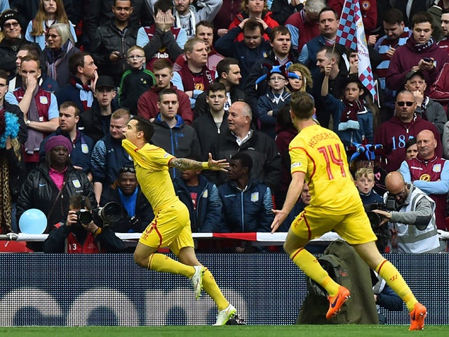 Liverpool's Brazilian midfielder Philippe Coutinho celebrates after scoring during the FA Cup semi-final between Aston Villa and Liverpool at Wembley stadium in London on April 19, 2015
