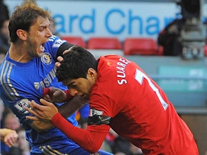 OTD: Suarez embroiled in biting controversy