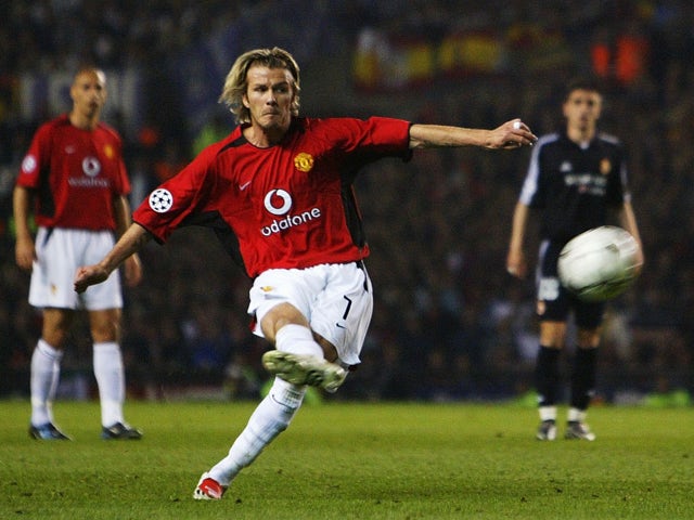David Beckham of Man Utd scores the third goal from a free kick during the UEFA Champions League quarter final, second leg match between Manchester United and Real Madrid on April 23, 2003