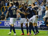 Magaye Gueye of Millwall FC celebrates scoring Millwall's 2nd goal during the Sky Bet Championship match between Millwall and Wigan Athletic at The Den on April 14, 2015