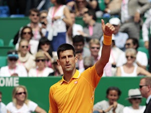 Djokovic comes from behind to beat Bellucci