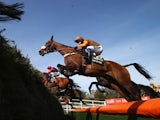 Oscar Time ridden by Sam Waley-Cohen in action during the 2015 Crabbie's Grand National at Aintree Racecourse on April 11, 2015