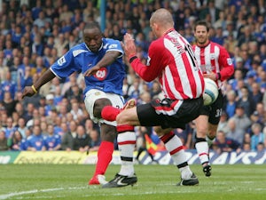 Lomana LuaLua of Southampton curls in his second goal during the Barclays Premiership match between Portsmouth and Southampton at Fratton Park on April 24, 2005