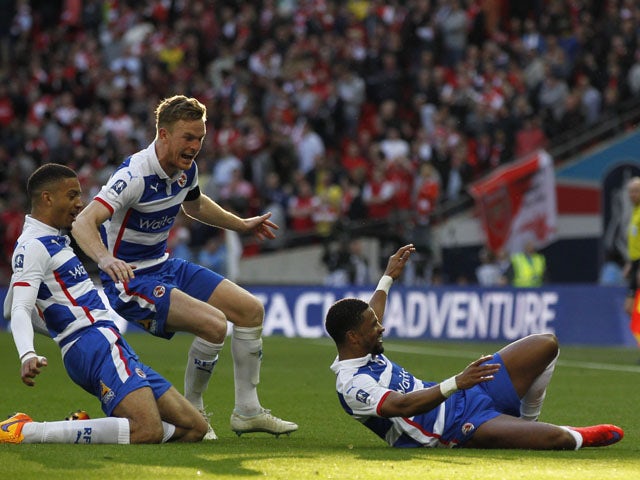 Reading's foward Jamaican forward Garath McCleary celebrates after scoring during the FA Cup semi-final between Arsenal and Reading at Wembley stadium in London on April 18, 2015