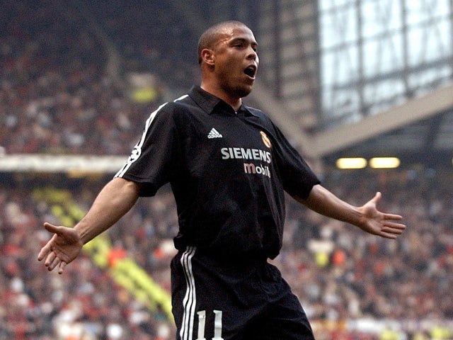 Real Madrid's Ronaldo celebrates after scoring against Manchester United during their UEFA Champions League quarter final 2nd leg at Old Trafford in Manchester 23 April 2003