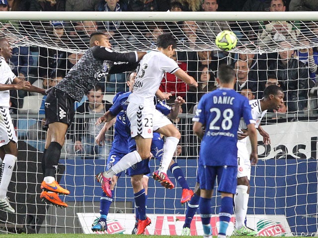 Reims' French Algerian defender Aissa Mandi scores a goal during the French L1 football match between Bastia (SCB) and Reims (SR) in the Armand Cesari stadium in Bastia, French Mediterranean island of Corsica, on April18, 2015