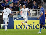 Reims' French forward David Ngog celebrates after scoring a goal during the French L1 football match between Bastia (SCB) and Reims (SR) in the Armand Cesari stadium in Bastia, French Mediterranean island of Corsica, on April18, 2015