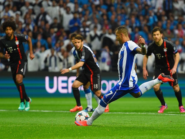 Ricardo Quaresma of FC Porto scores their first goal from the penalty spot during the UEFA Champions League Quarter Final first leg match between FC Porto and FC Bayern Muenchen at Estadio do Dragao on April 15, 2015