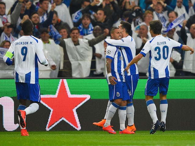 Ricardo Quaresma of FC Porto (3R) celebrates with team mates as he scores their second goal during the UEFA Champions League Quarter Final first leg match between FC Porto and FC Bayern Muenchen at Estadio do Dragao on April 15, 2015