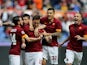 Francesco Totti #10 with his teammates of AS Roma celebrates after scoring the opening goal from penalty spot during the Serie A match between AS Roma and Atalanta BC at Stadio Olimpico on April 19, 2015