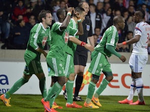 Saint-Etienne's players celebrates after scoring a goal during the French L1 football match between Lyon and Saint-Etienne on April 19, 2015