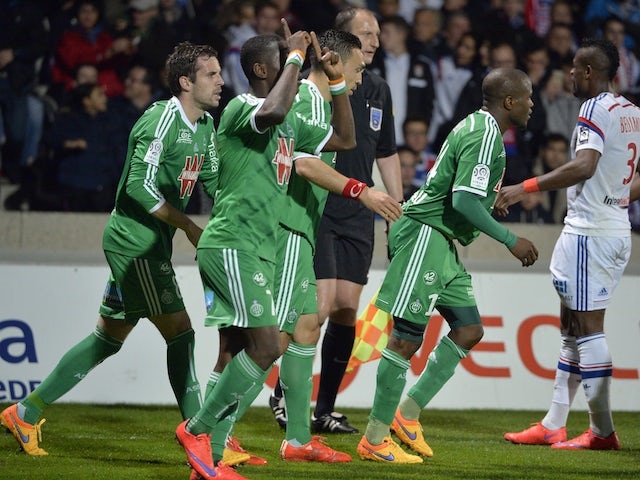Saint-Etienne's players celebrates after scoring a goal during the French L1 football match between Lyon and Saint-Etienne on April 19, 2015