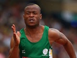 Simon Magakwe of South Africa competes in the Men's 100 metres heats at Hampden Park Stadium during day four of the Glasgow 2014 Commonwealth Games on July 27, 2014