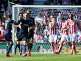 Morgan Schneiderlin of Southampton celebrates the first goal with his team-mates during the Barclays Premier League match between Stoke City and Southampton at the Britannia Stadium on April 18, 2015 