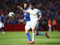 Nelson Oliveria of Swansea City and Marcin Wasilewski of Leicester City tussle for the ball during the Barclays Premier League match between Leicester City and Swansea City at The King Power Stadium on April 18, 2015