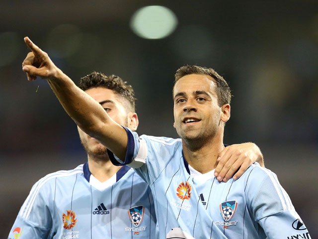 Alex Brosque and Christopher Naumoff of Sydney FC celebrate a goal during the round 26 A-League match between the Newcastle Jets and the Sydney FC at Hunter Stadium on April 17, 2015