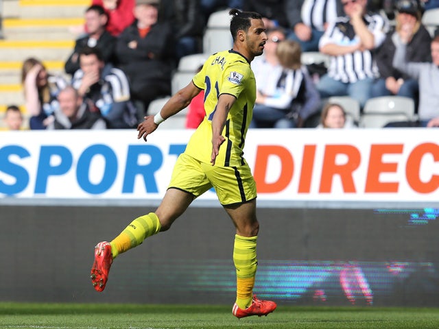 Nacer Chadli of Spurs celebrates scoring the opening goal during the Barclays Premier League match between Newcastle United and Tottenham Hotspur at St James' Park on April 19, 2015