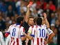 Arda Turan of Atletico Madrid (10) is sent off by referee Felix Brych during the UEFA Champions League quarter-final second leg match between Real Madrid CF and Club Atletico de Madrid at Bernabeu on April 22, 2015