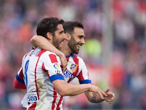 Atletico ease to Elche victory