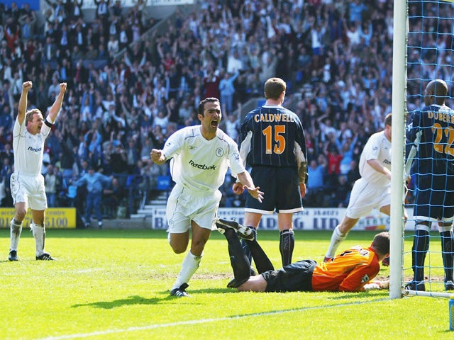 Youri Djorkaeff of Bolton celebrates his second goal during the FA Barclaycard Premiership match between Bolton Wanderers and Leeds United at The Reebok Stadium, on May 2, 2004