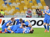 FC Dnipro's players celebrate after scoring a goal during the UEFA Europa League second leg quarter-final football match between FC Dnipro Dnipropetrovsk and Club Brugge KV in Kiev on April 23, 2015