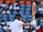 England's batsman Gary Ballance reacts after scoring his half-century (50 runs) during day three of the second Test cricket match between the West Indies and England at the Grenada National Stadium in Saint George's on April 23, 2015