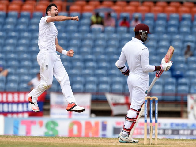 England's bowler James Anderson leaps into the air to celebrate dismissing West Indies batsman Marlon Samuels during the final day of the second Test cricket match between the West Indies and England at the Grenada National Cricket Stadium in Saint George