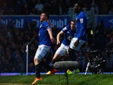 James McCarthy of Everton (16) celebrates with Seamus Coleman and Romelu Lukaku as he scores their first goal during the Barclays Premier League match between Everton and Manchester United at Goodison Park on April 26, 2015