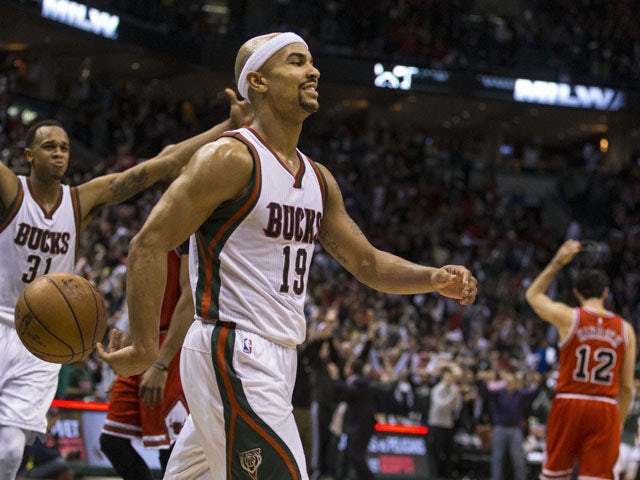 Guard Jerryd Bayless #19 of the Milwaukee Bucks is is all smiles after he hit the game winning shot against the Chicago Bulls in the fourth quarter of game four of the first round of the 2015 NBA Playoffs April 25, 2015