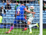 Josh Meekings of Inverness Caledonian Thistle apparently handles the ball on the goal line from Leigh Griffiths of Celtic during the William Hill Scottish Cup Semi Final match between Inverness Caledonian Thistle and Celtic at Hamden Park on April 19, 201