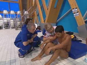 Colombian diver injured as China take gold