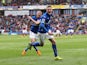 Jamie Vardy of Leicester City celebrates scoring their first goal with Paul Konchesky of Leicester City during the Barclays Premier League match between Burnley and Leicester City at Turf Moor on April 25, 2015