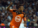 Lorient's forward Jordan Ayew celebrates after scoring a goal during the French L1 football match between Marseille and Lorient on April 24, 2015