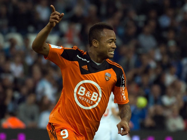 Lorient's forward Jordan Ayew celebrates after scoring a goal during the French L1 football match between Marseille and Lorient on April 24, 2015